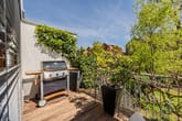 Balkonterrasse mit Platz für Grill und entspannte Stunden